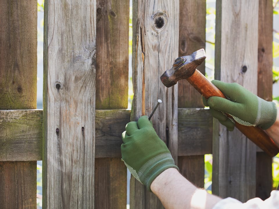Nailing cedar fence boards to the rail